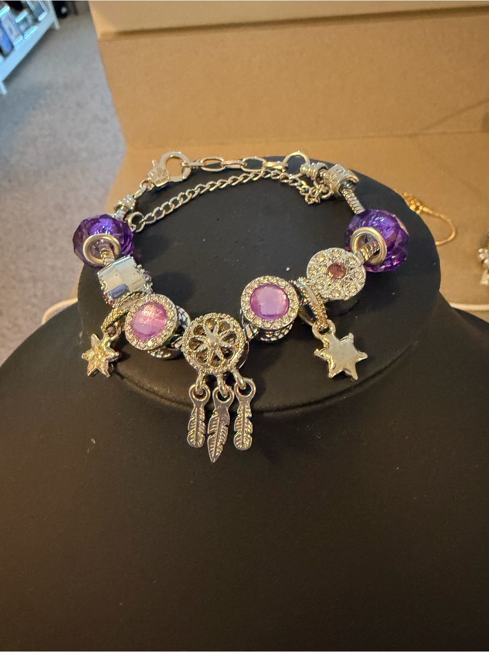Silver Charm Bracelet with Purple Beads and Dreamcatcher Accent